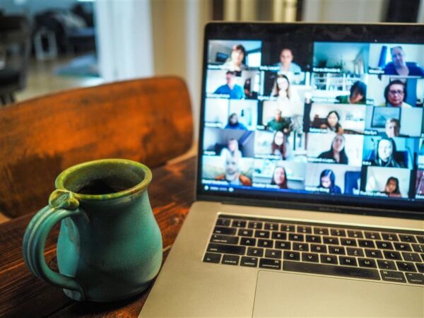 Open laptop and cup of coffee