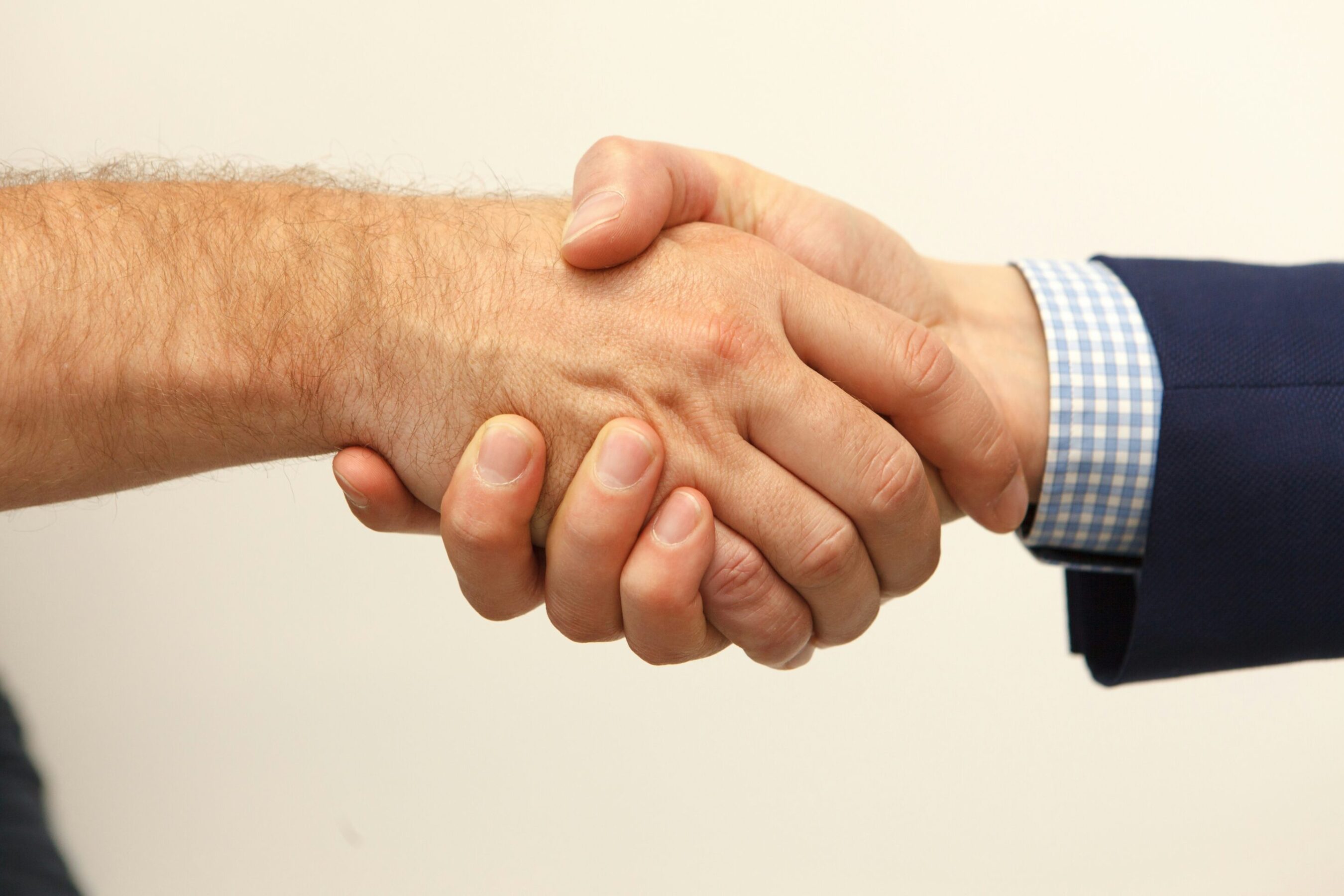 Two hands shaking in Negotiation